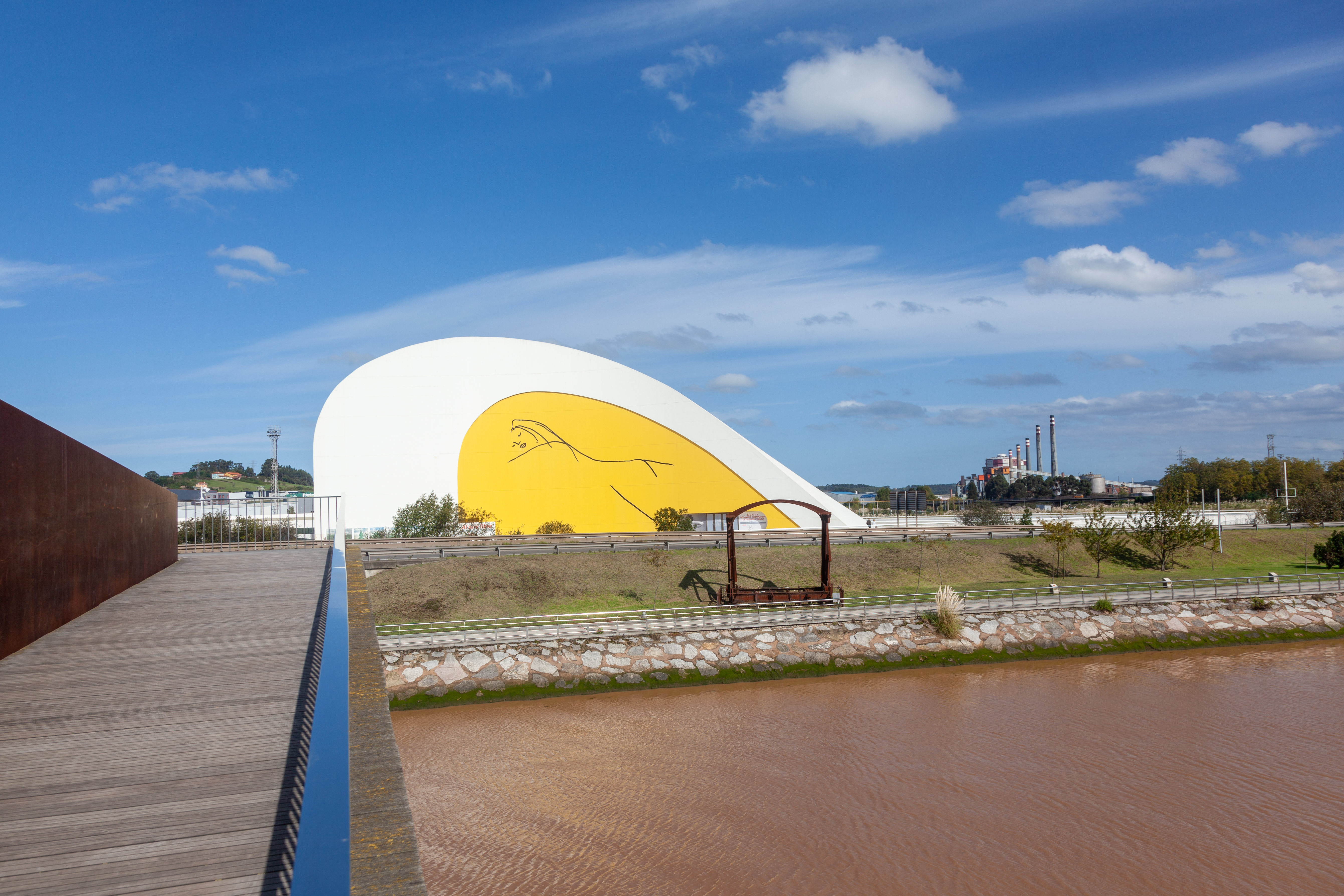 a building with a yellow and white design