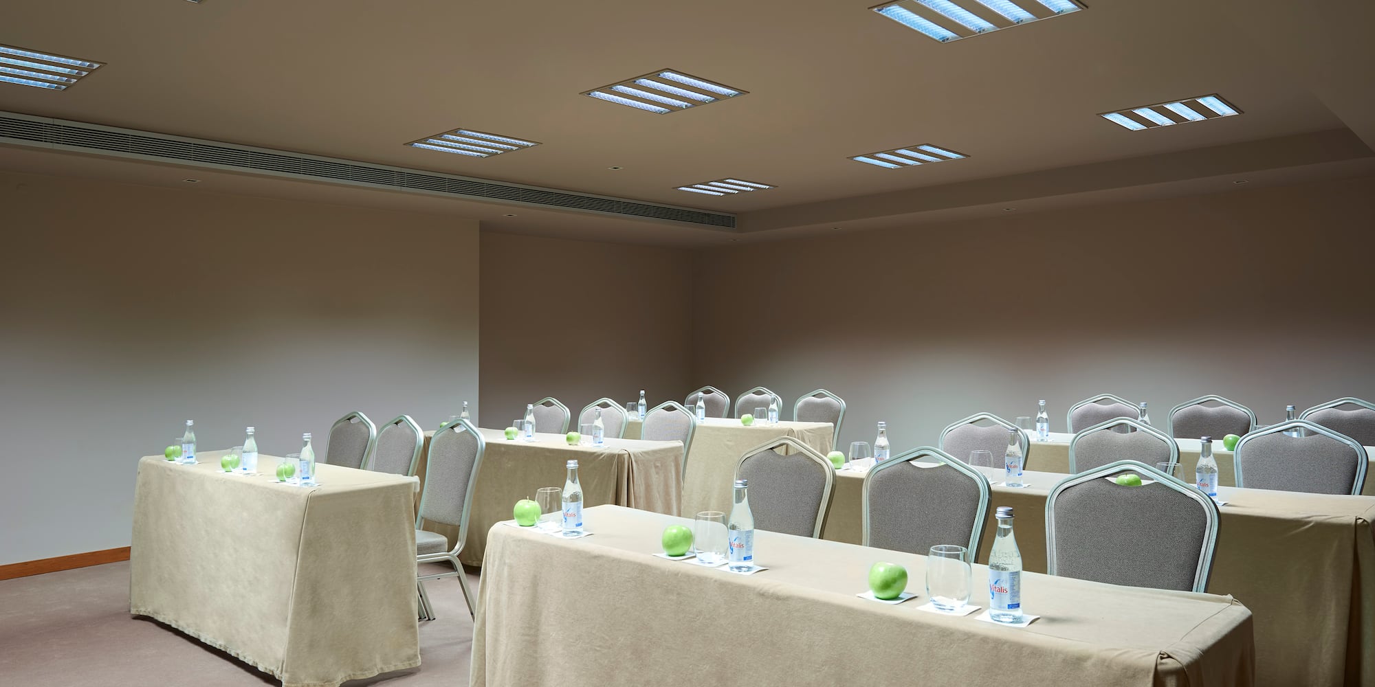 a room with tables and chairs