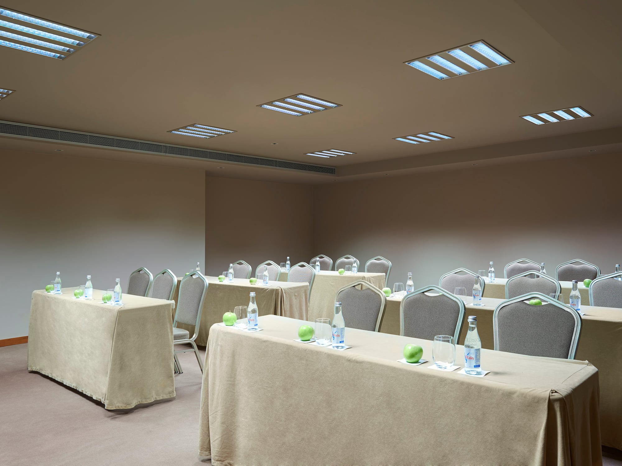 a room with tables and chairs