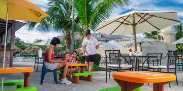 a group of people sitting at a table
