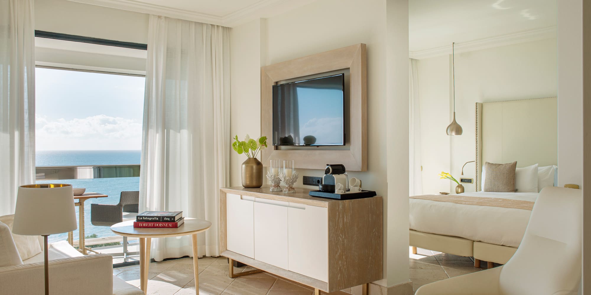 a room with a television and a table