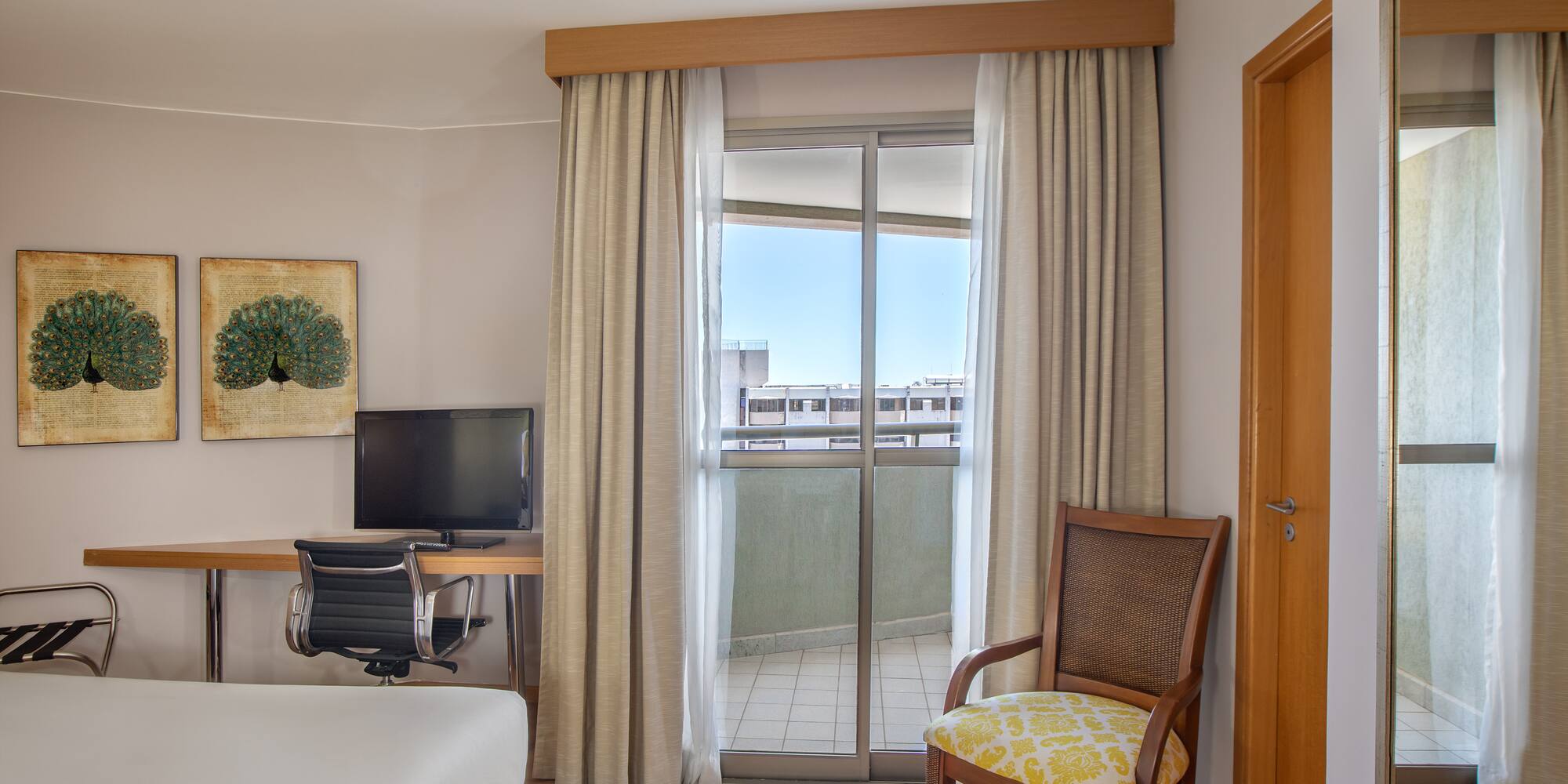 a room with a bed and a chair