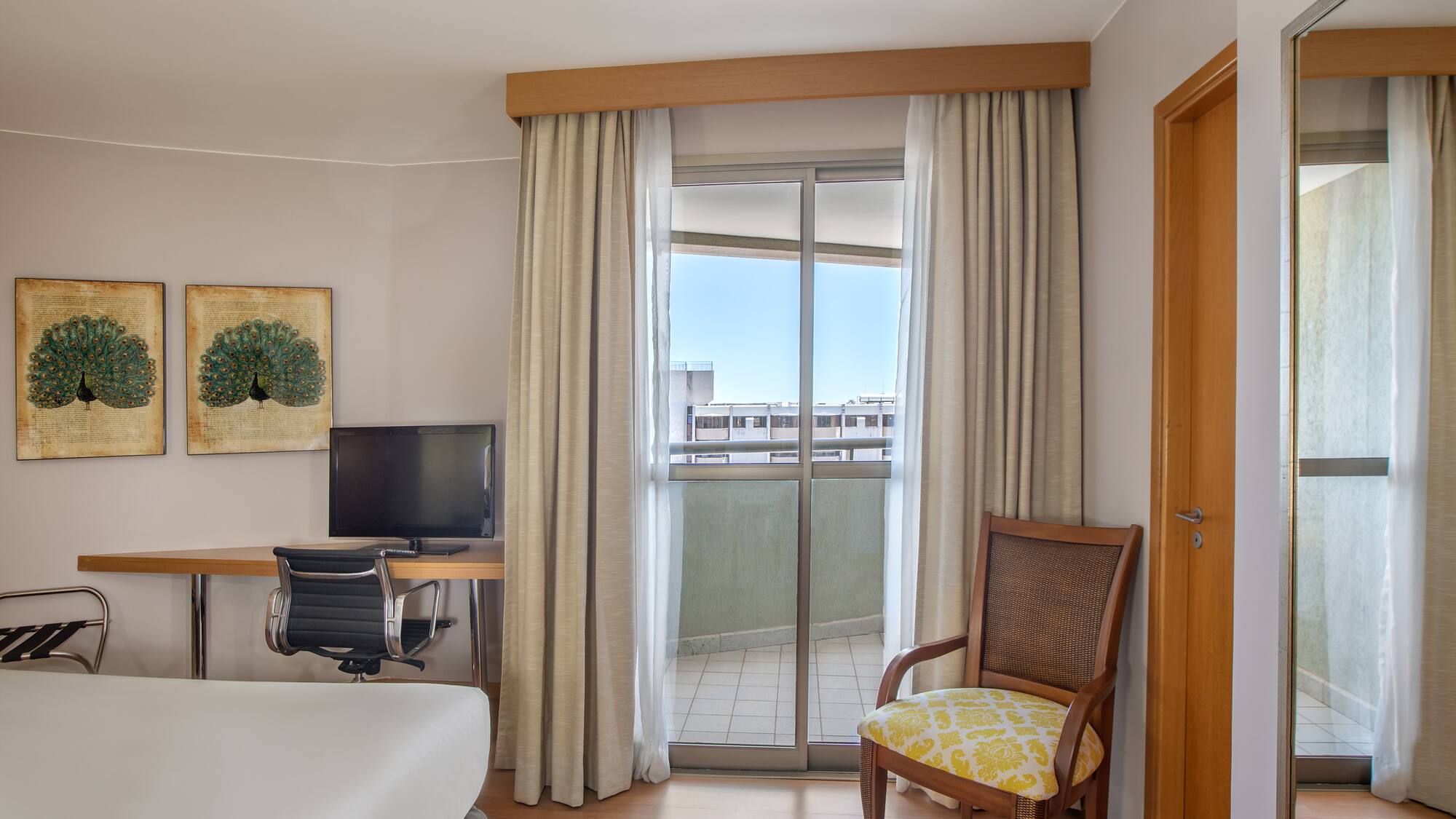 a room with a bed and a chair