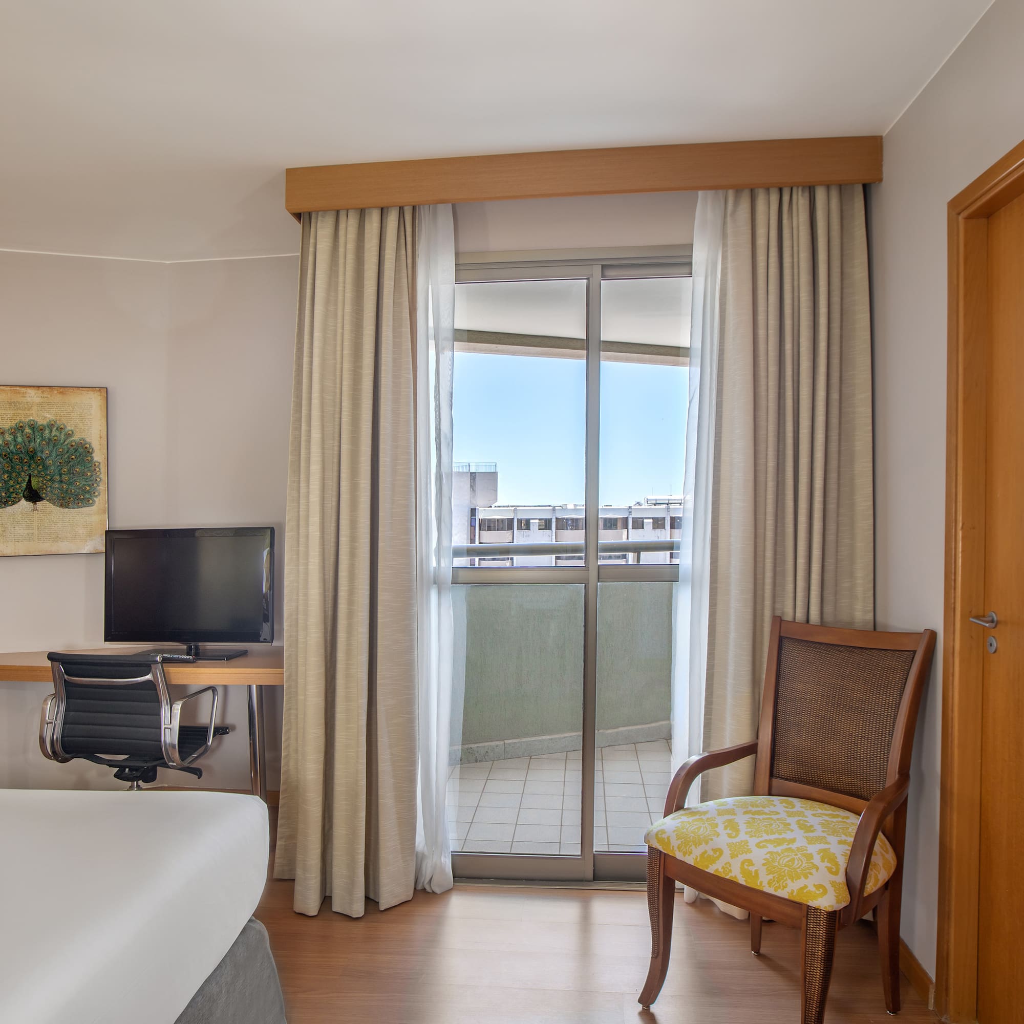 a room with a bed and a chair