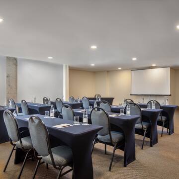 a room with tables and chairs