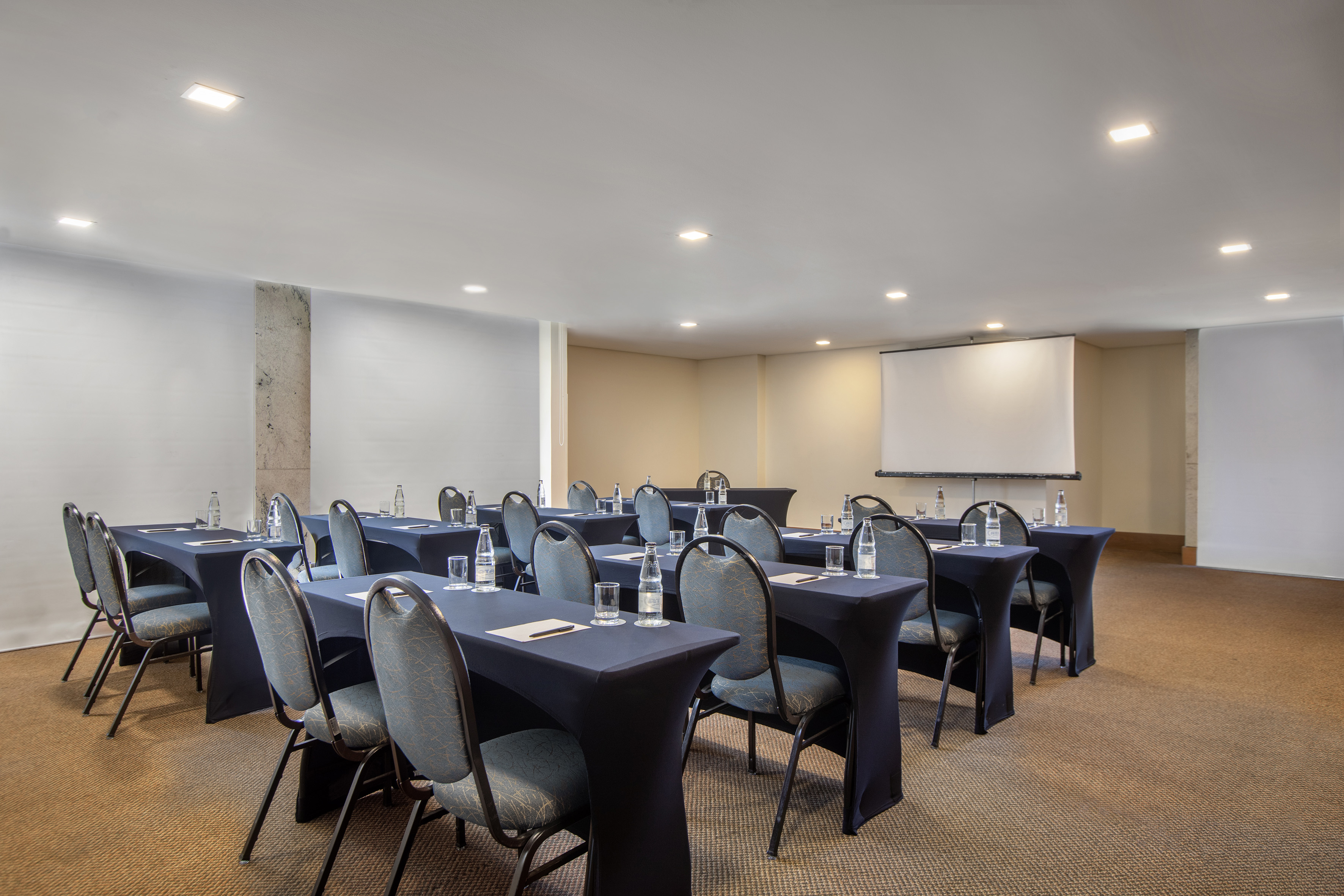 a room with tables and chairs