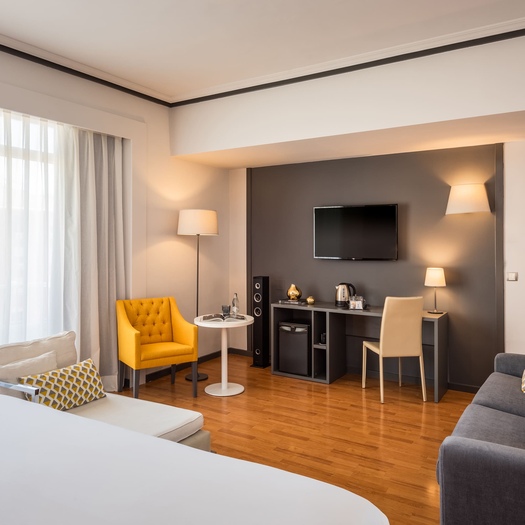 a room with a couch and a tv