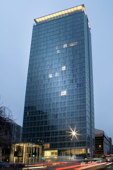 a tall glass building with windows