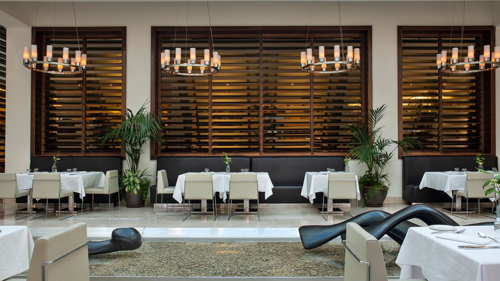 a room with tables and chairs