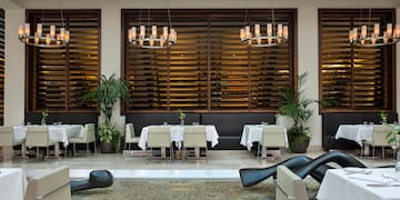 a room with tables and chairs