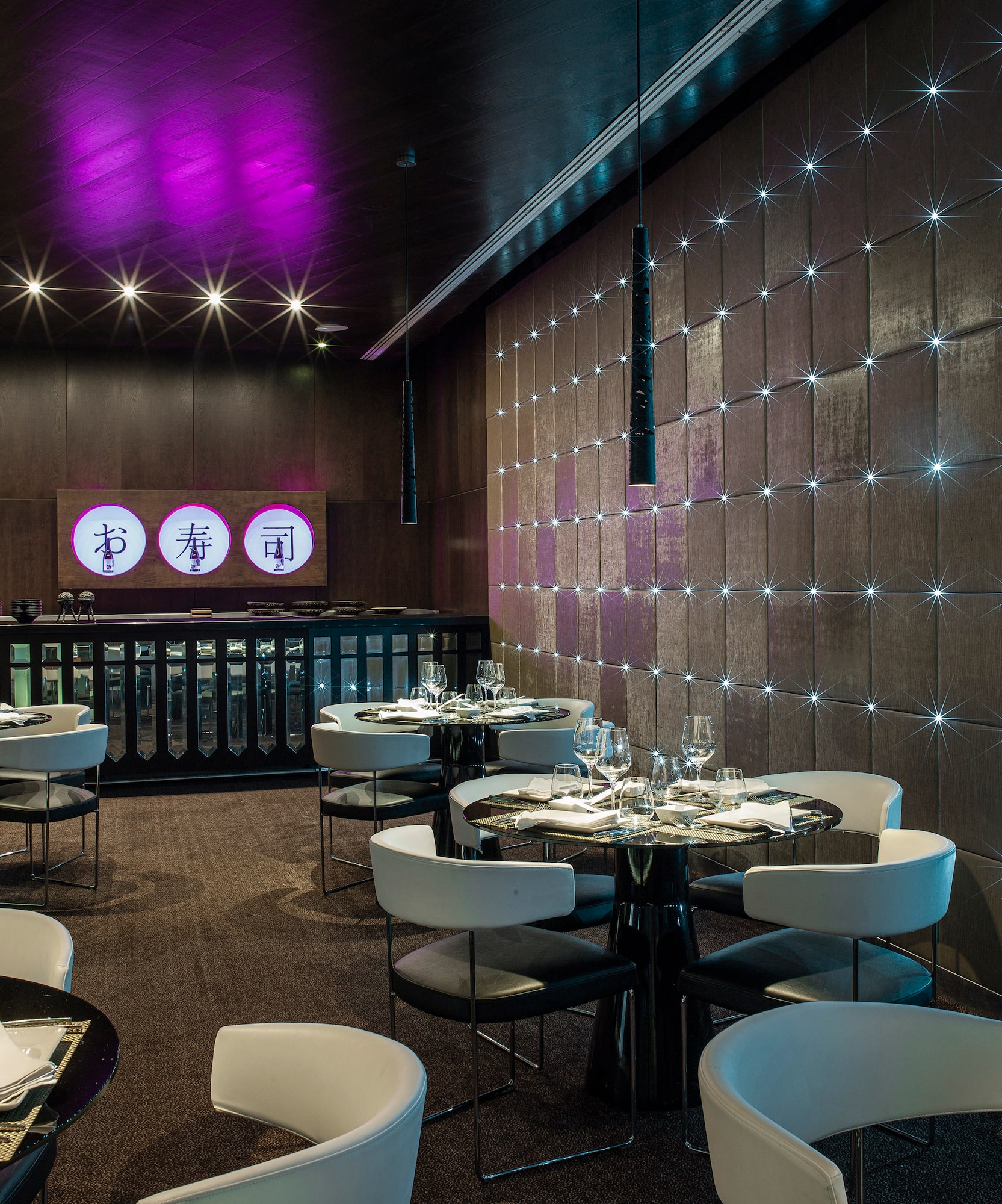 a room with tables and chairs