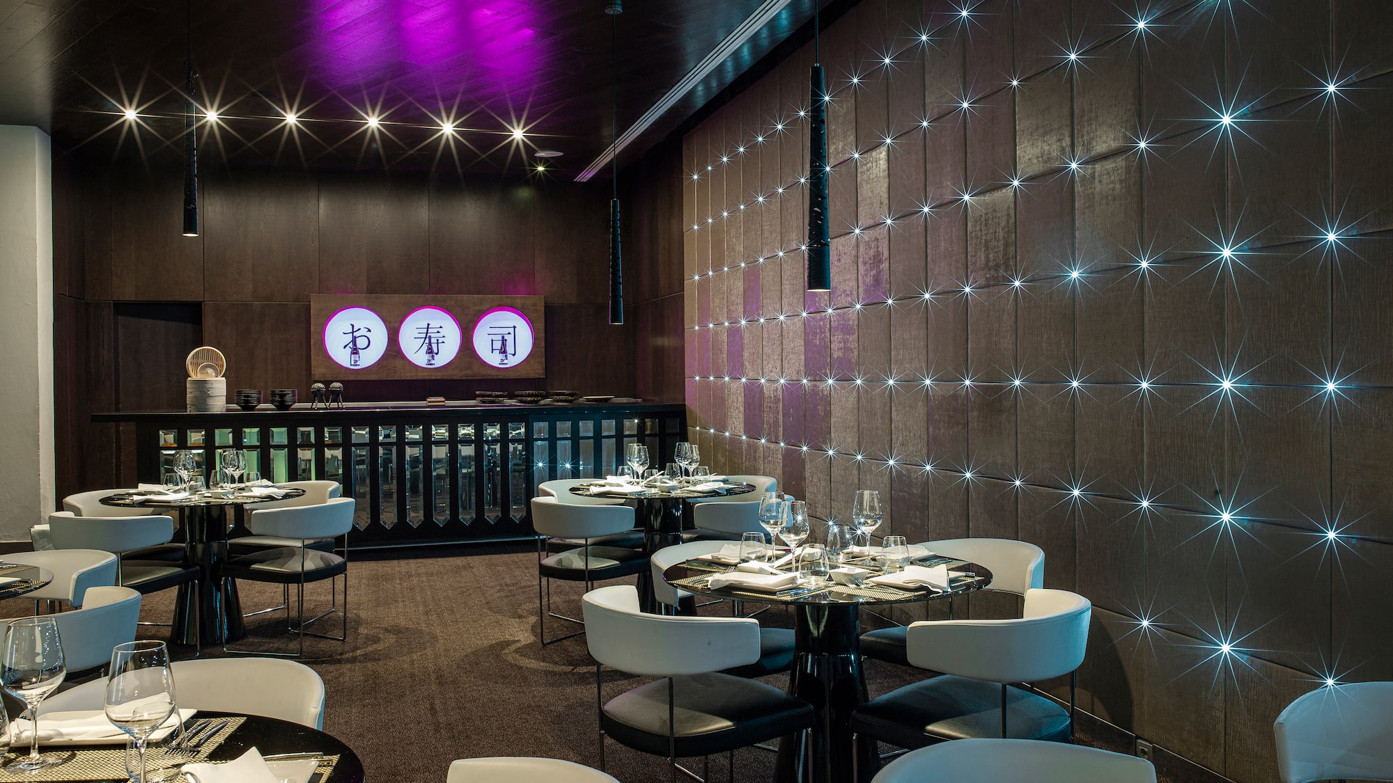 a room with tables and chairs