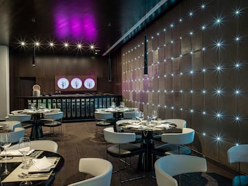 a room with tables and chairs