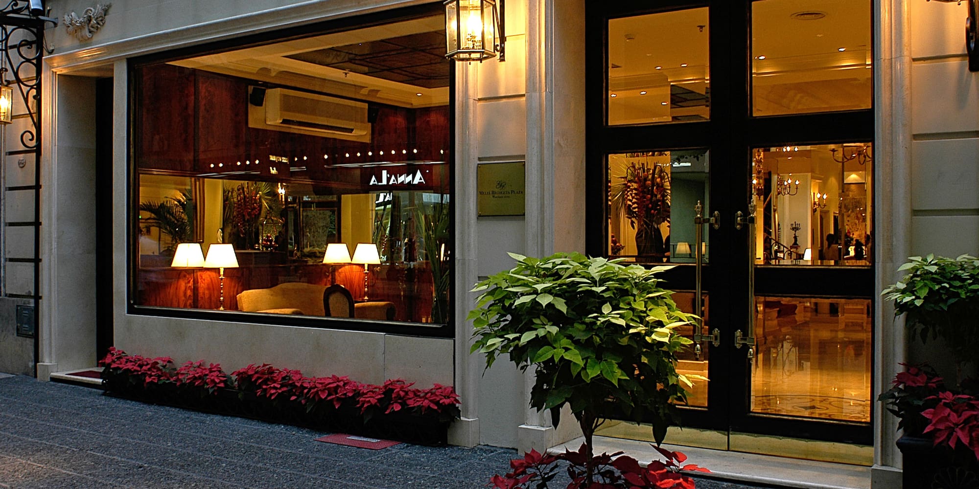 a building with glass doors and windows