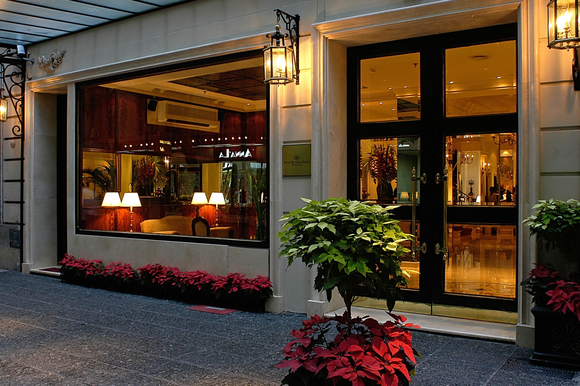 a building with glass doors and windows