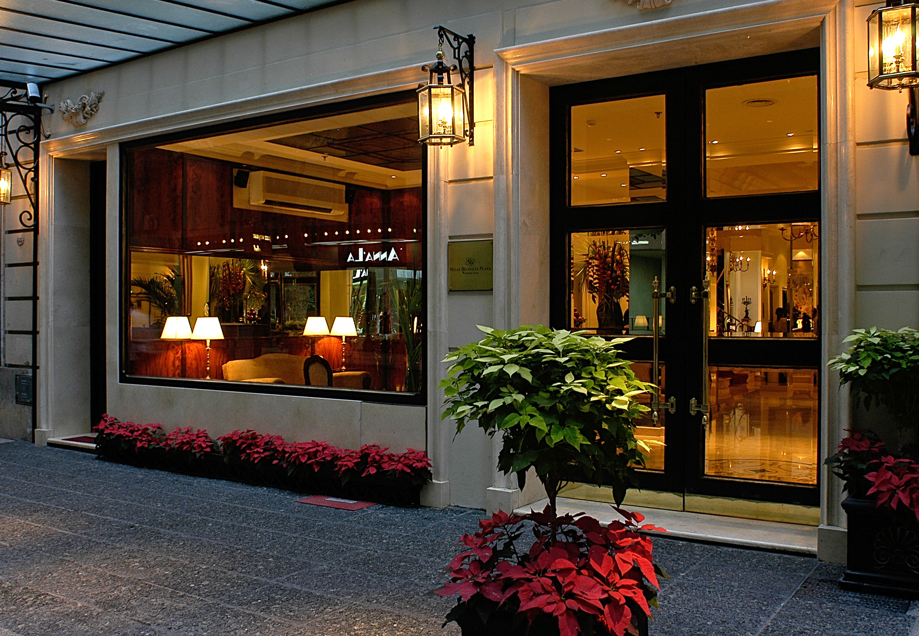 a building with glass doors and windows - Melia Recoleta Plaza, Buenos Aires