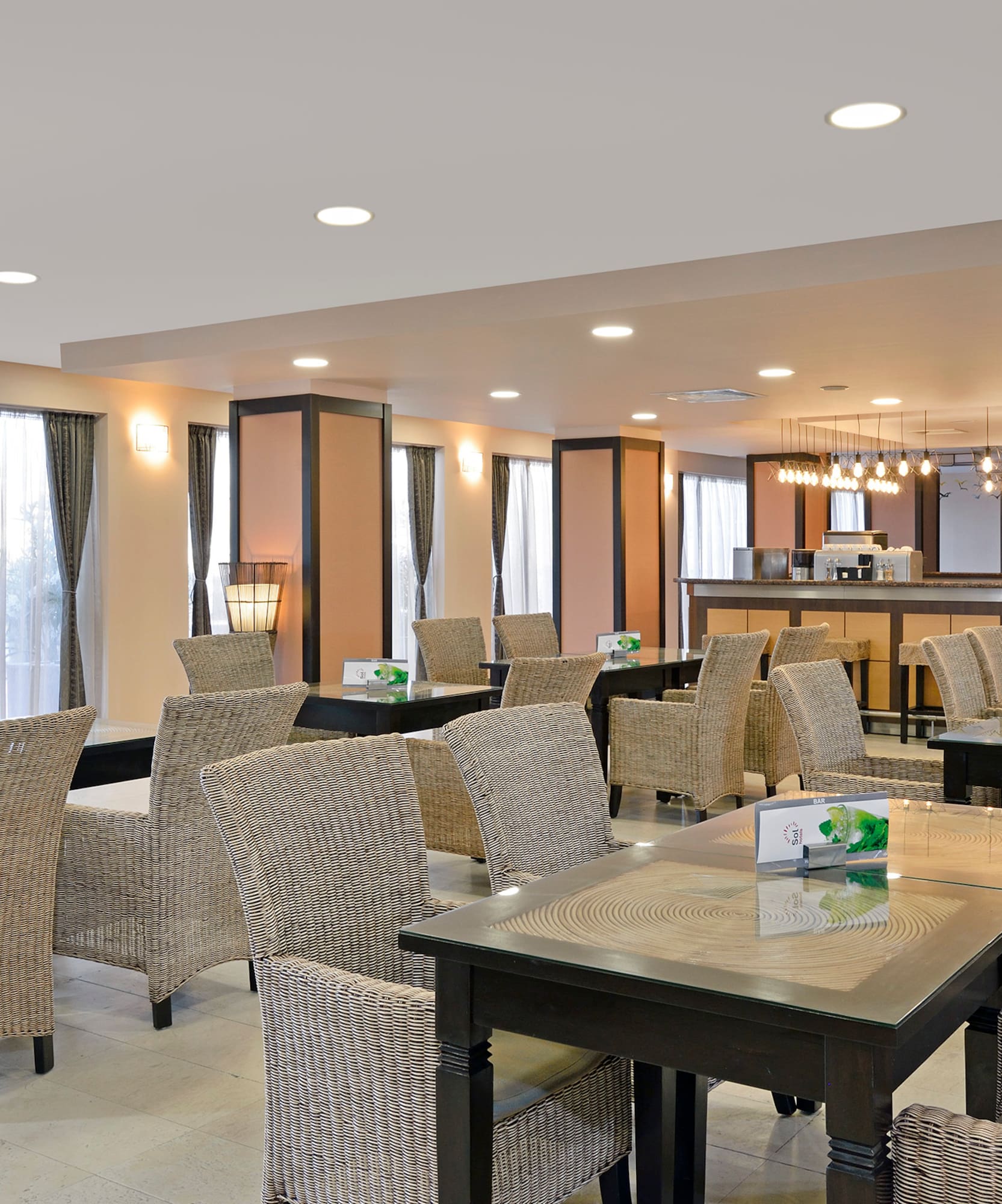 a restaurant with tables and chairs