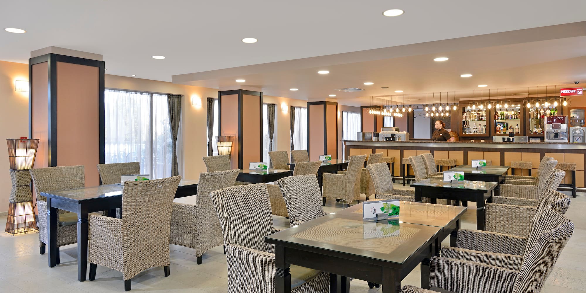 a restaurant with tables and chairs