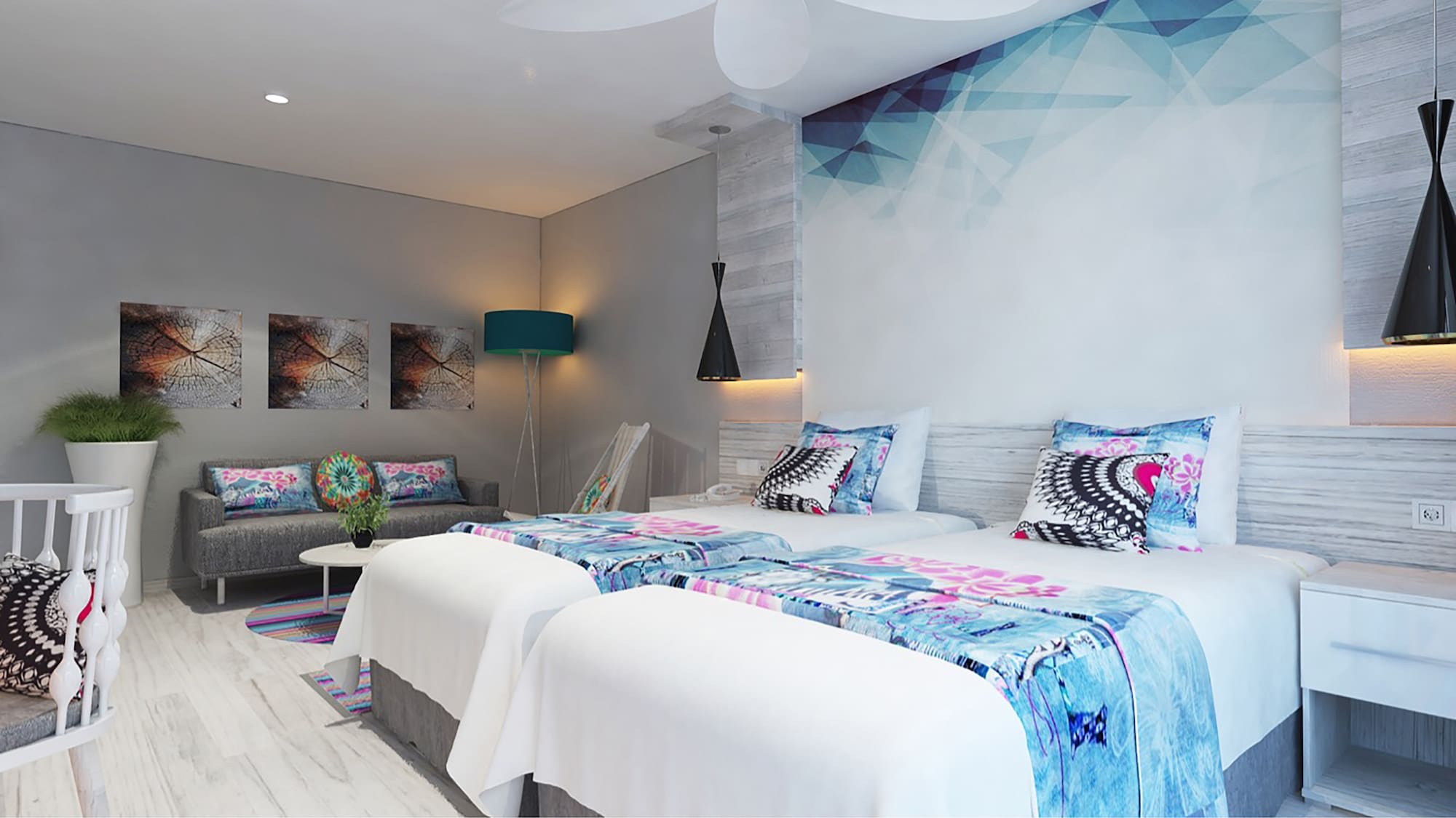 a room with two beds and a lamp