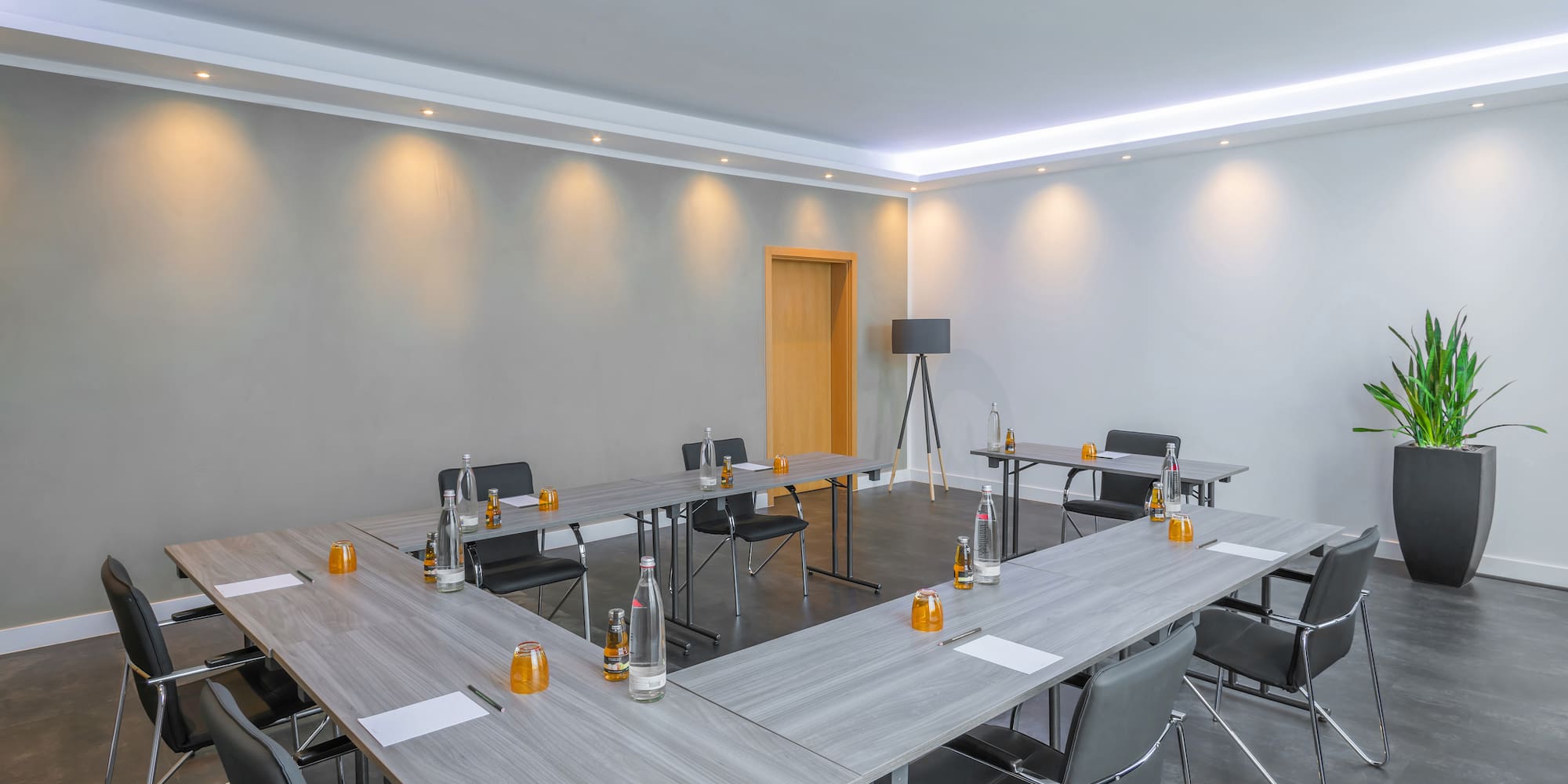 a room with tables and chairs