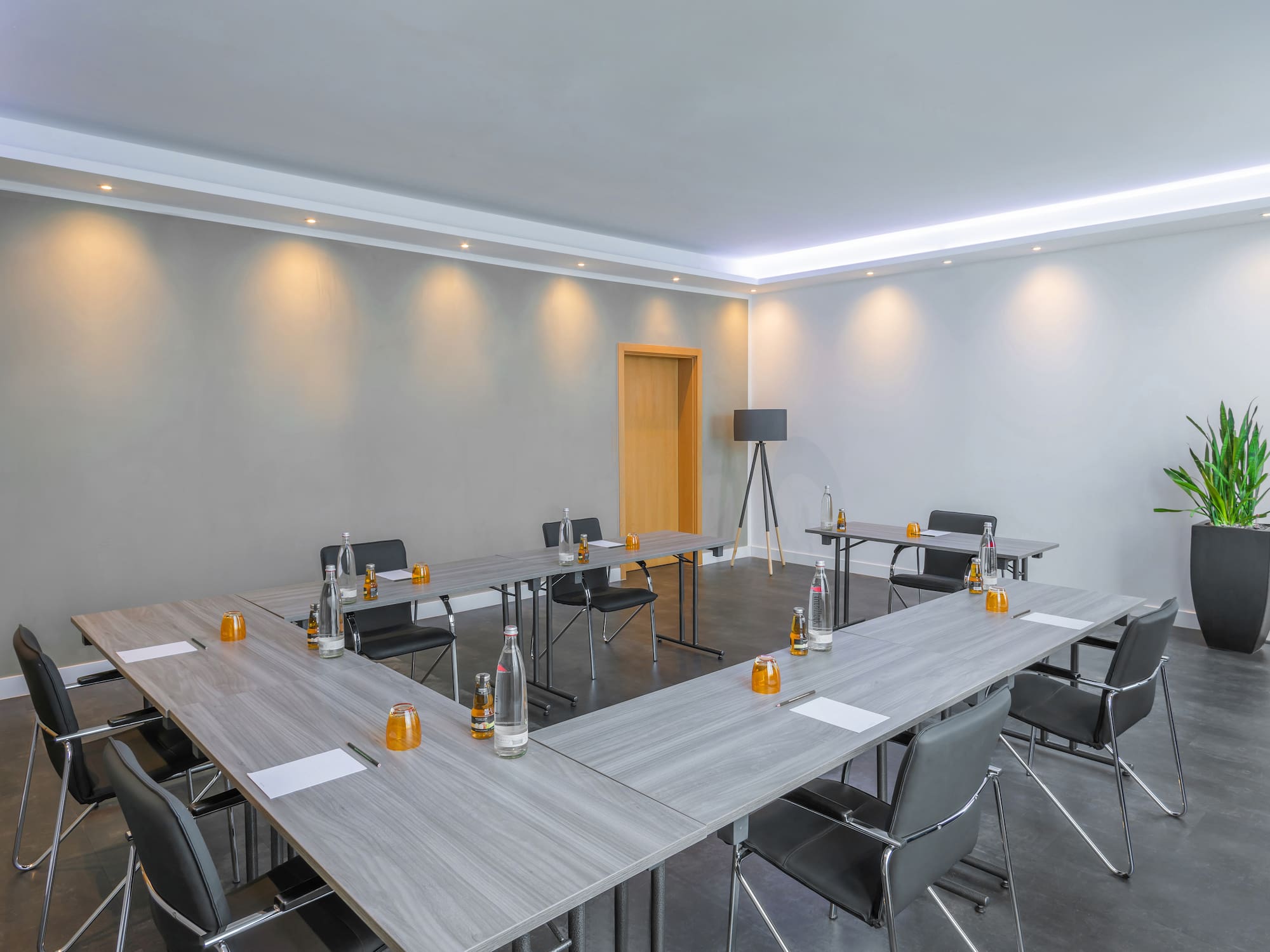 a room with tables and chairs