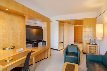 a room with a television and a table