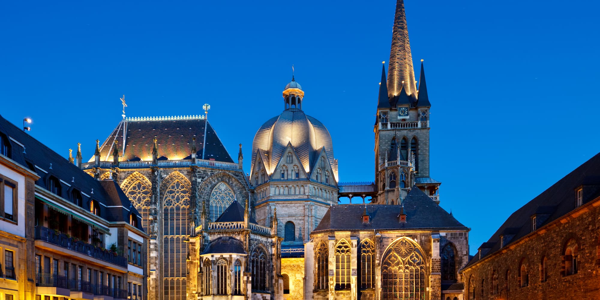 a street with buildings and a church