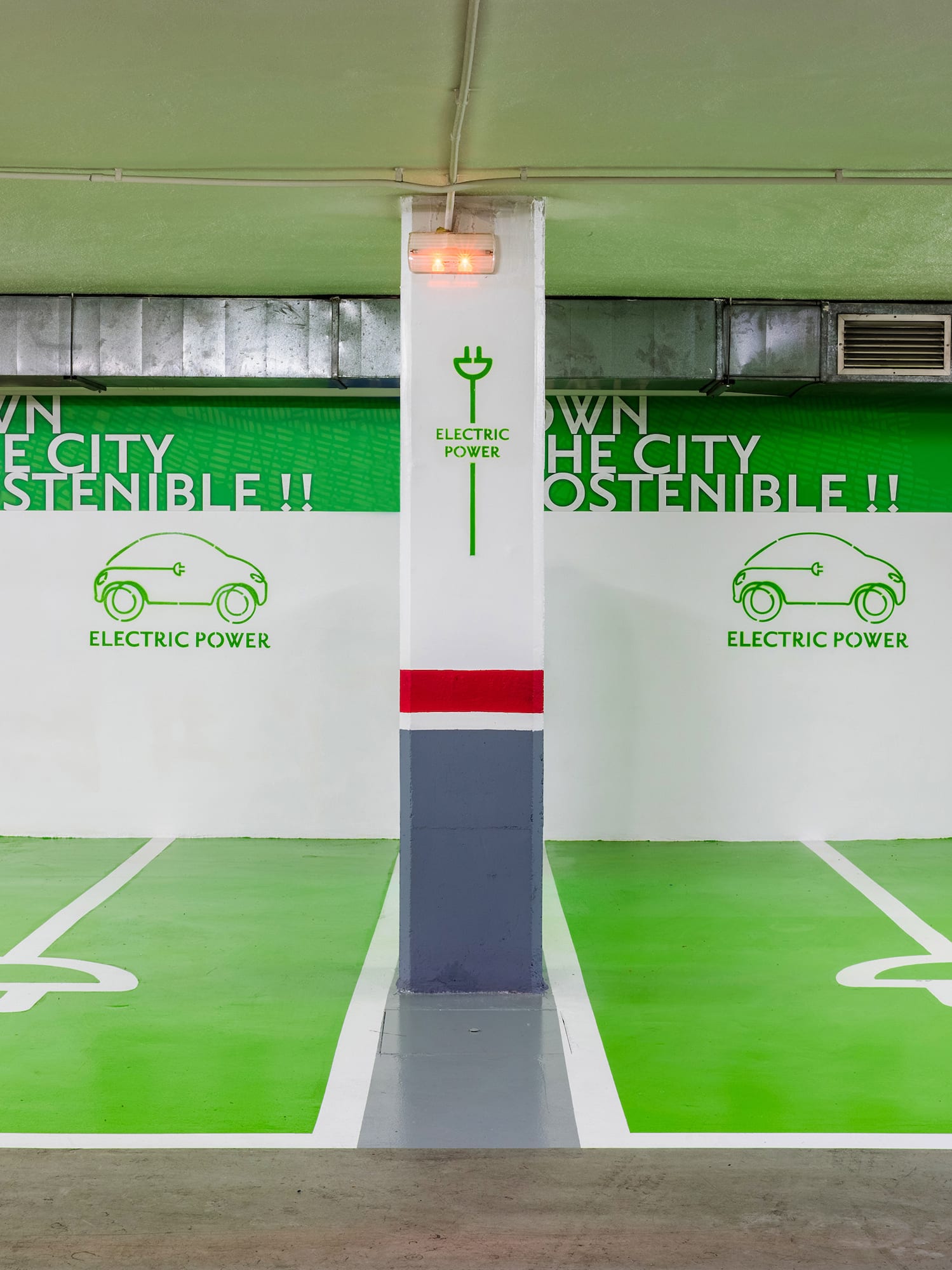 a green and white parking garage