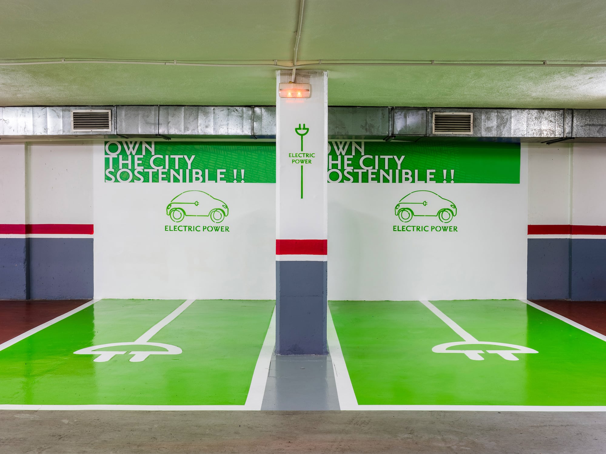 a green and white parking garage