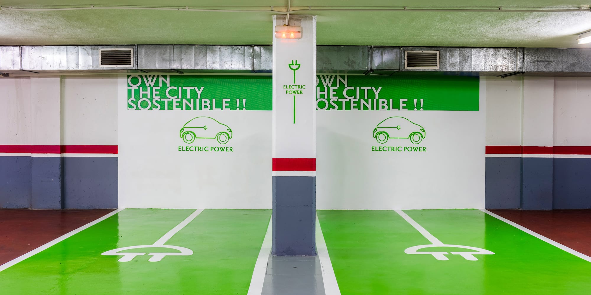 a green and white parking garage