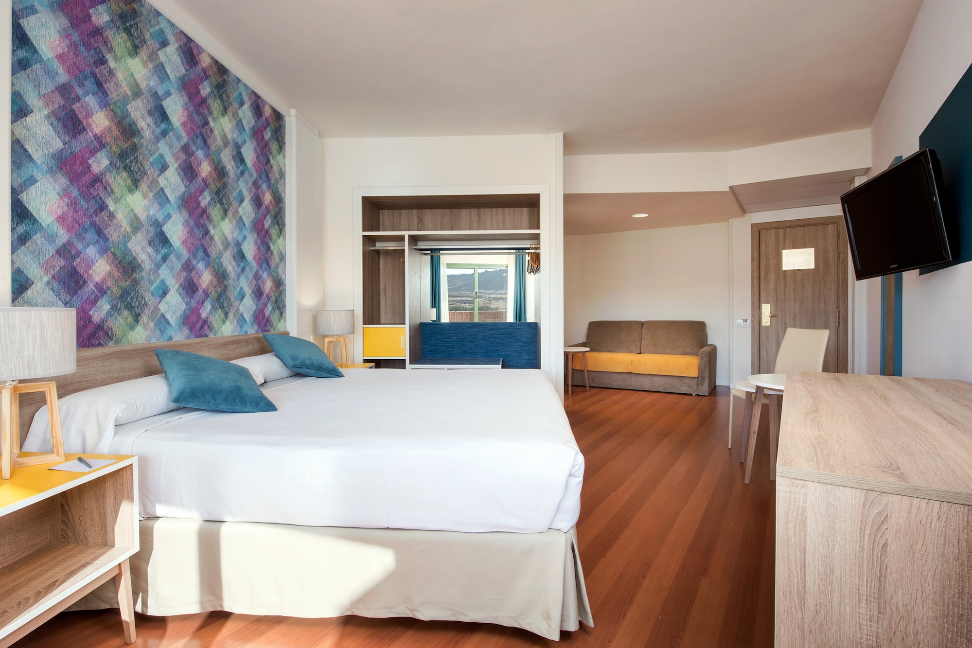 a room with a bed and a couch