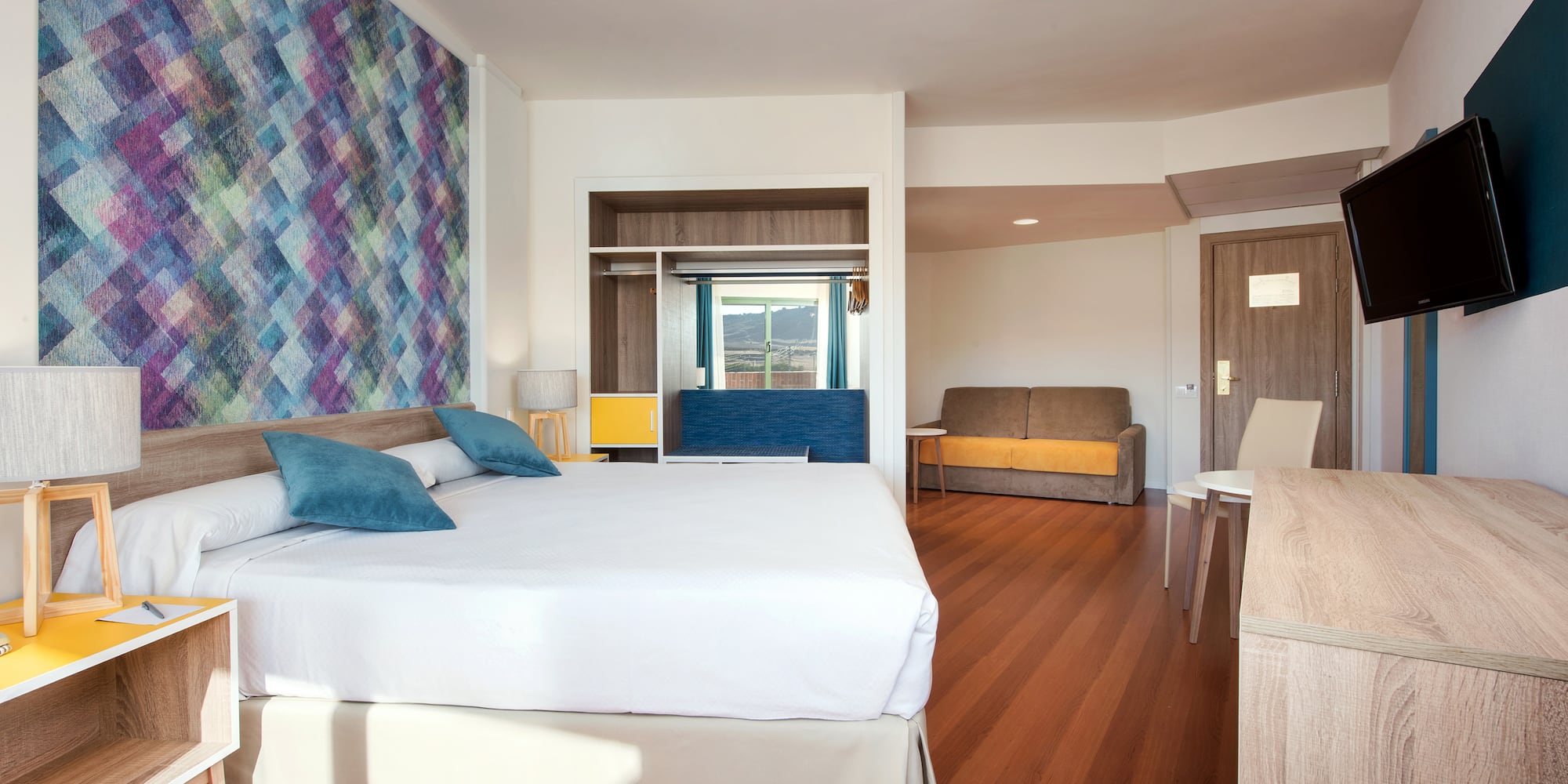 a room with a bed and a couch