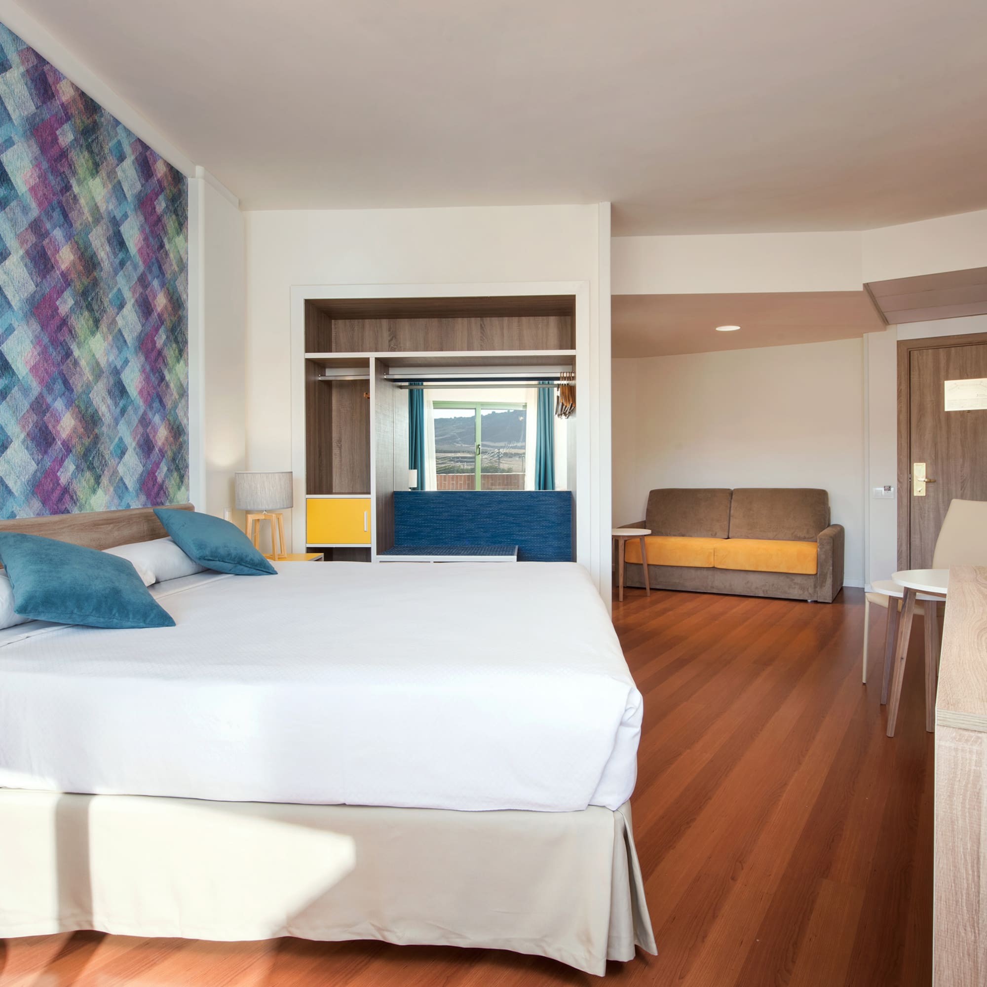 a room with a bed and a couch