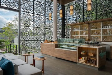 a room with a large window and a counter