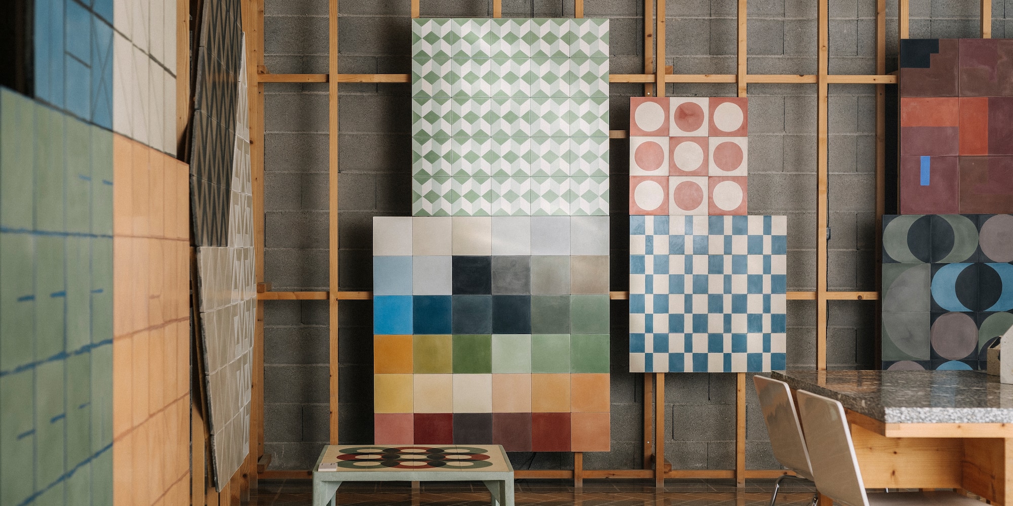 a room with a table and chairs and a board