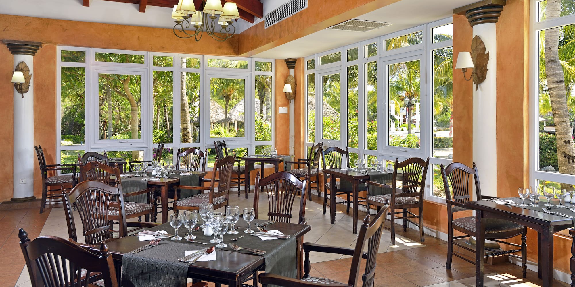 a restaurant with tables and chairs