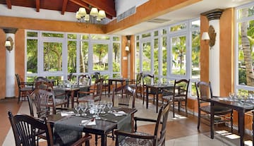 a restaurant with tables and chairs