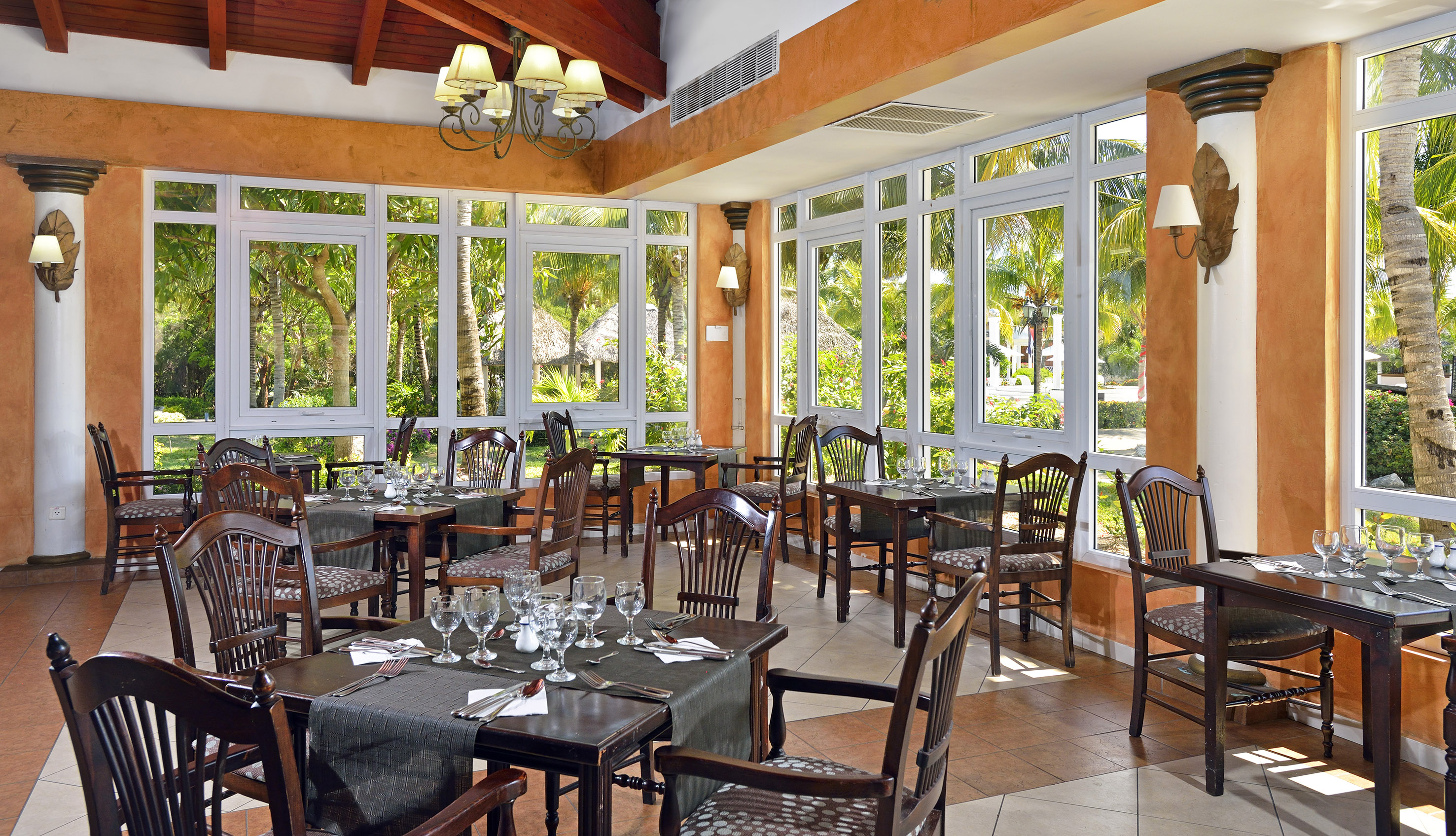 a restaurant with tables and chairs