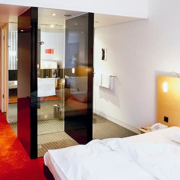 a bedroom with glass doors