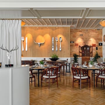 a room with tables and chairs