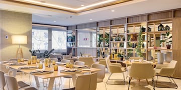 a room with tables and chairs