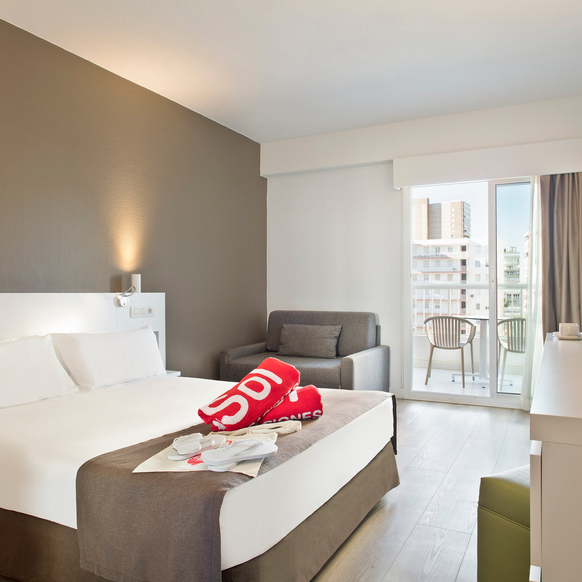 a room with a bed and a chair