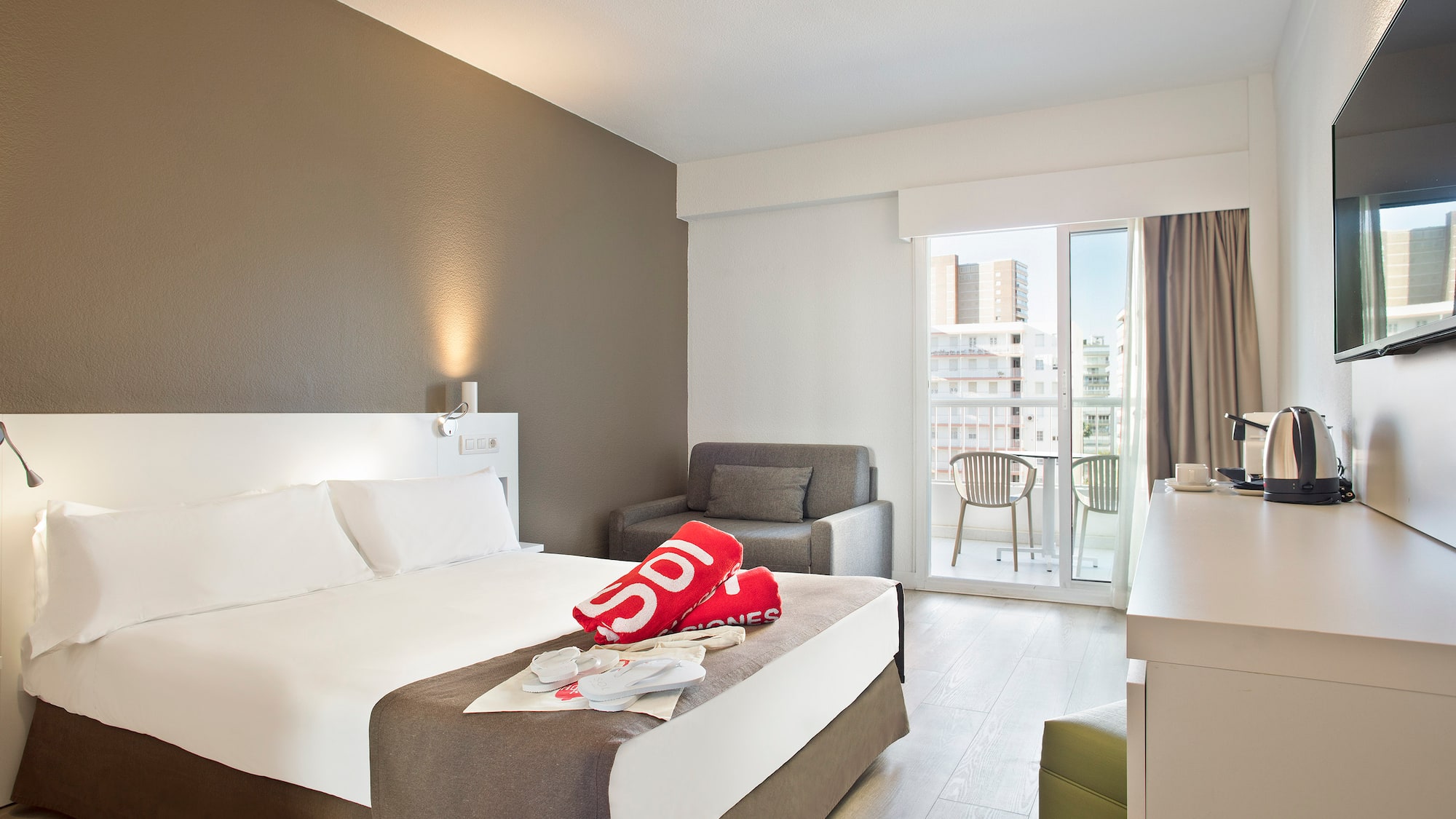 a room with a bed and a chair