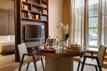 a room with a table and chairs