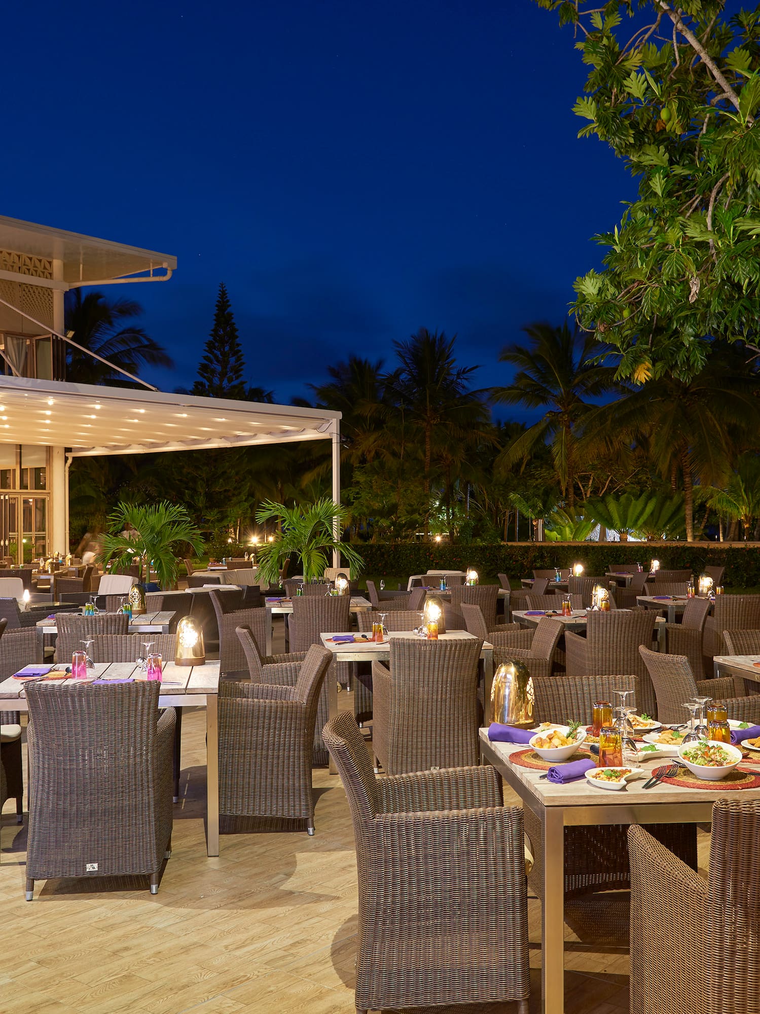 a restaurant with tables and chairs
