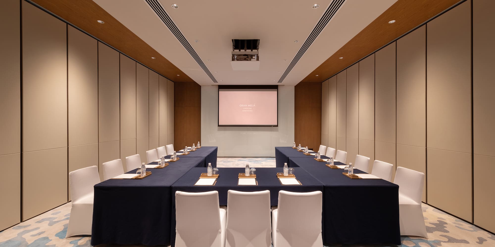 a room with a table and chairs