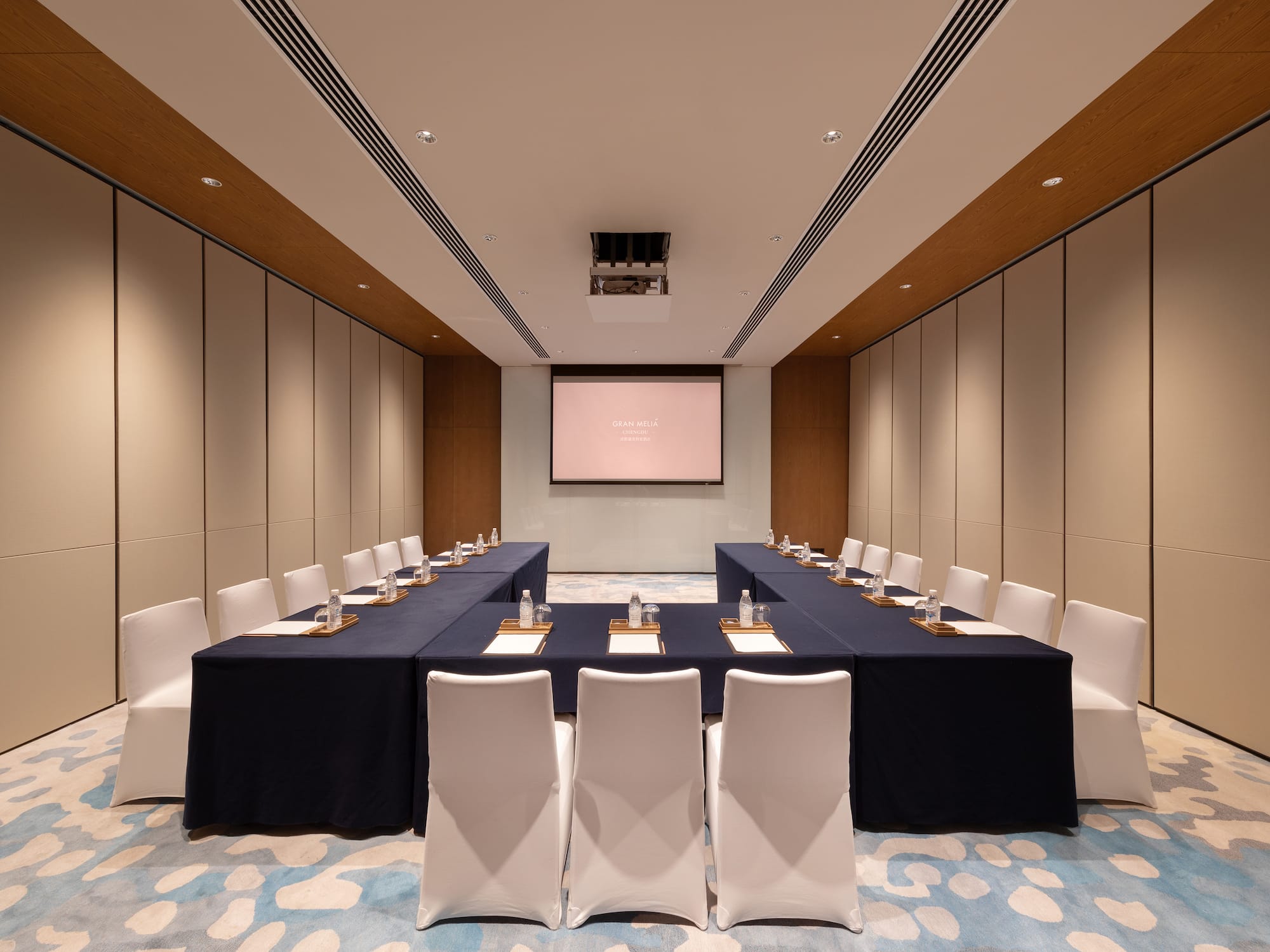 a room with a table and chairs