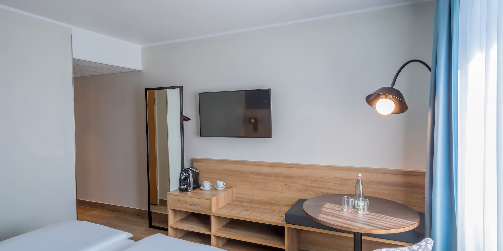 a room with a table and chairs