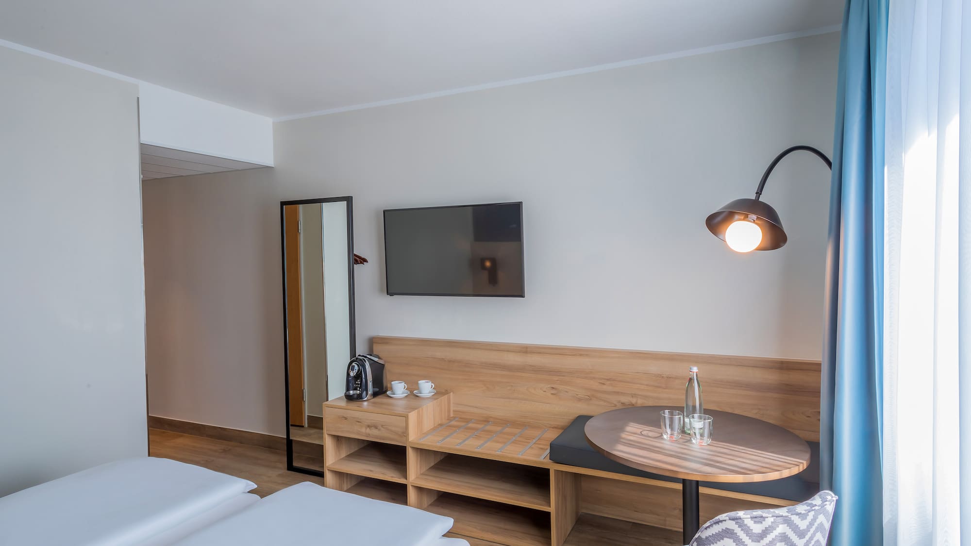 a room with a table and chairs