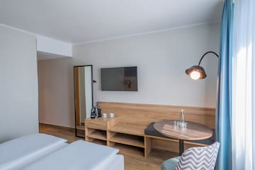 a room with a table and chairs